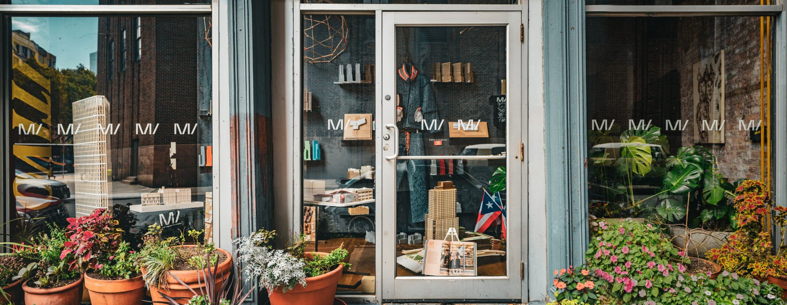 Window display featuring architectural models